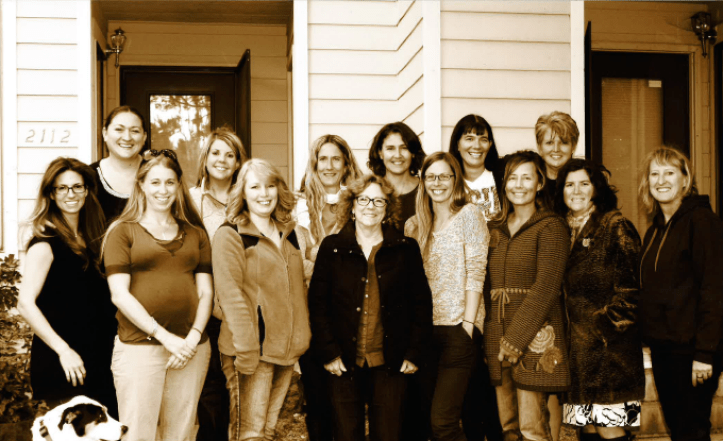 The Combined Child & Family and School-Based Clinical Team. From left: Ratchet; Elizabeth Fitzgerald, clinical supervisor SBHC; Kelsey Dunlap, clinician; Amy Richardson, clinician; Misty Groom, Safe-School assessor; Tracey Sanders, administrative assistant; Janice Garceau, program manager; Maryanne McDonnell, clinical supervisor; Jill Montecucco, clinician; Marie Jackson, SBHC clinician; Jodi Love, clinician; Jaymie Kaczmarek, SBHC clinician; Jennifer Noble, SBHC clinician; Tracey Colocicco, clinician; Deb Stone, clinician.